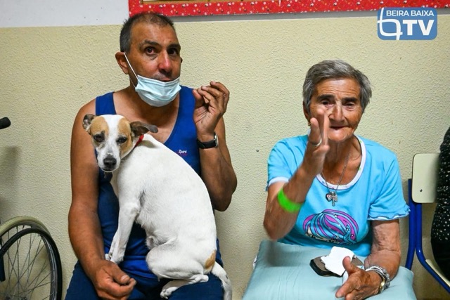 A resident looking at the damage